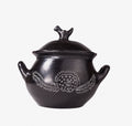 Olla de cerámica negra con flor